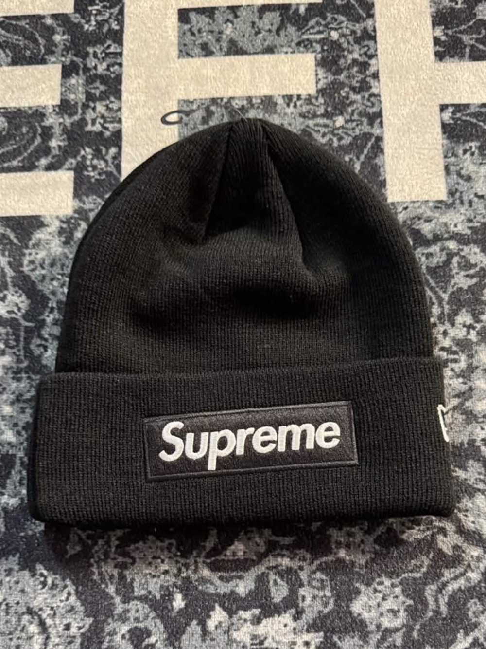 New Era Black Beanie with Supreme Patch